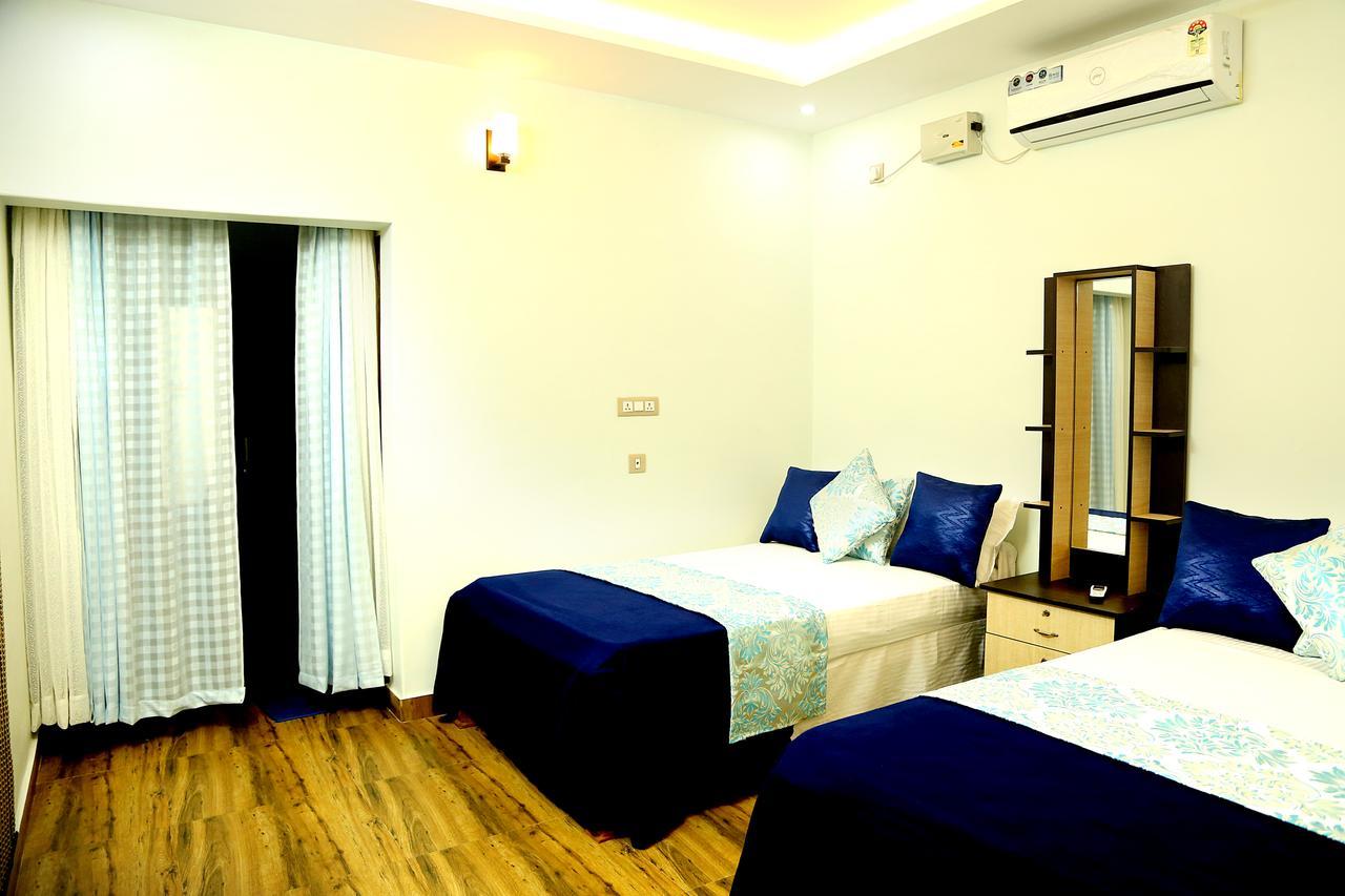 Amritham Holidays Homestay Trivandrum 特里凡得琅 外观 照片